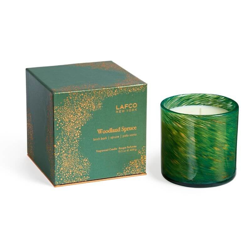 Lafco 15.5oz home candle in a clear glass container with a white wax interior, elegant and suitable for home decor.
