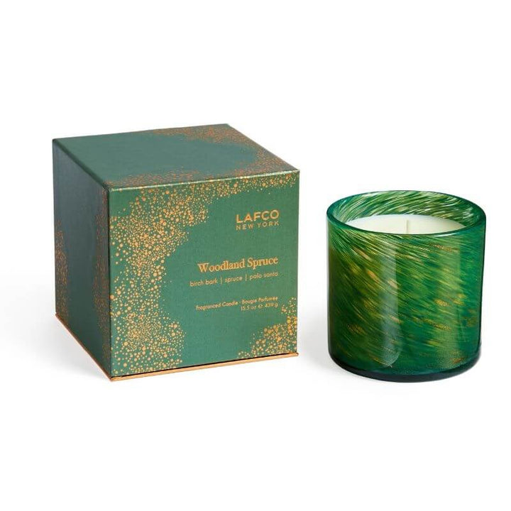 Lafco 15.5oz home candle in a clear glass container with a white wax interior, elegant and suitable for home decor.