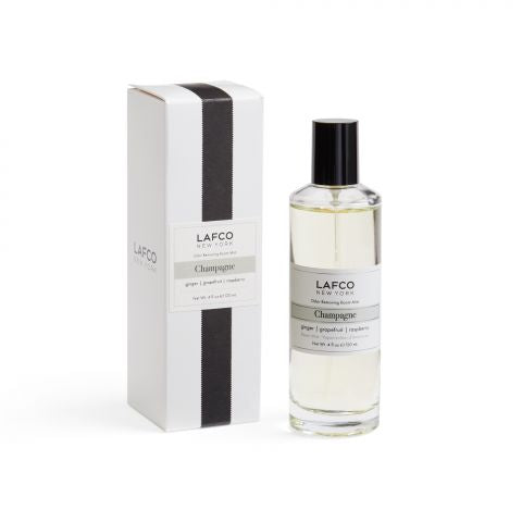 Lafco Odor Removing Room Mist 4oz spray bottle, freshening the air with a natural scent for home use.