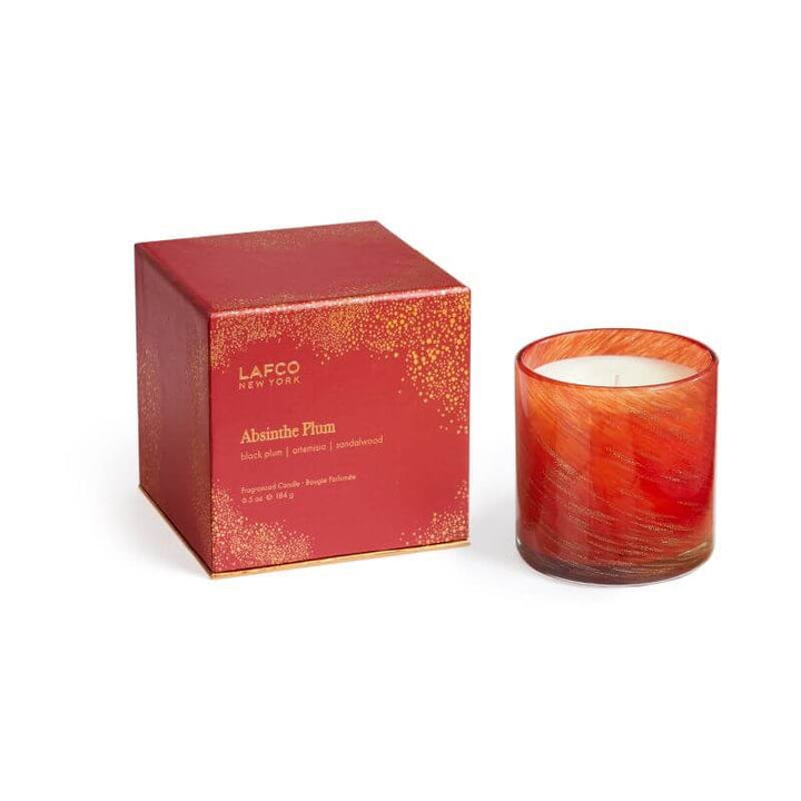 Lafco 6.5oz home candle with a sleek glass container and white wax, designed to add elegance to home decor.