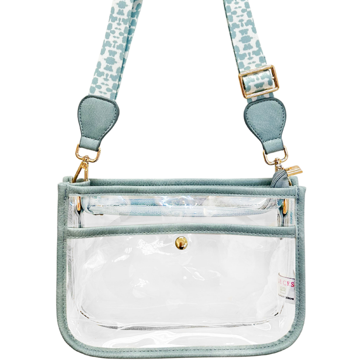 Clear stadium bag by Laura Park Designs for accessories, showing transparent material and sturdy handles.