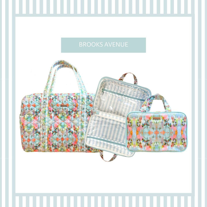 Laura Park Designs Brooks Avenue Travel Case, stylish accessory with a textured fabric exterior and zipper closure.