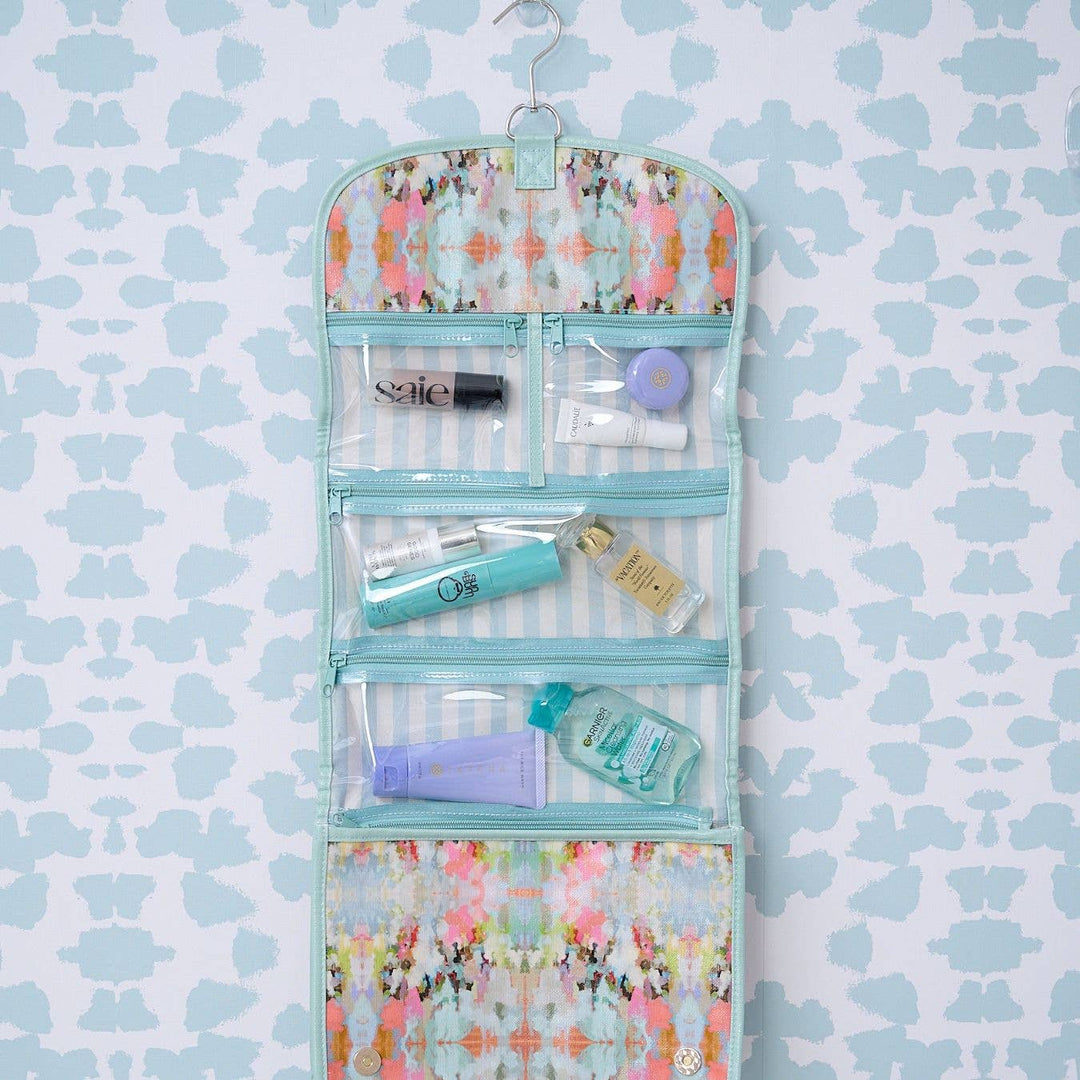 Laura Park Designs Brooks Ave Hanging Travel Case, a compact travel gift bag with a stylish pattern and hanging hook.