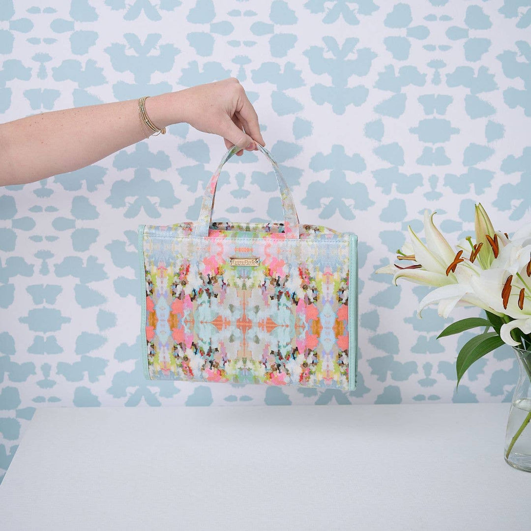 Laura Park Designs Brooks Ave Hanging Travel Case, stylish gift travel organizer with multiple compartments and secure hanging hook.