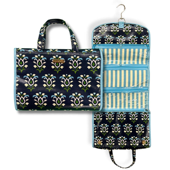 Rosemary Indigo hanging travel case by Laura Park Designs, featuring compact fabric storage with a handle and travel-friendly design.