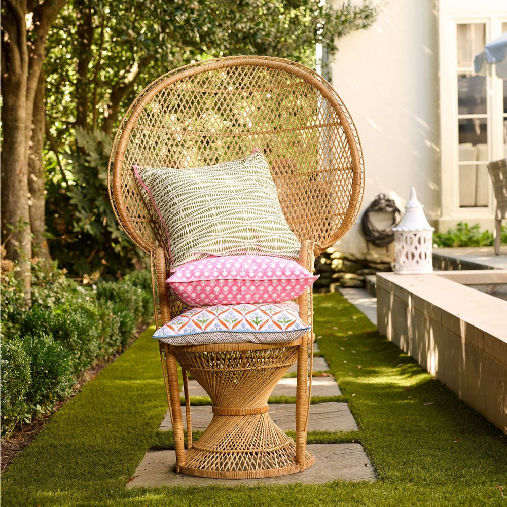Pink block print pillow from Laura Park Designs, featuring vibrant geometric pattern, perfect for home decor.