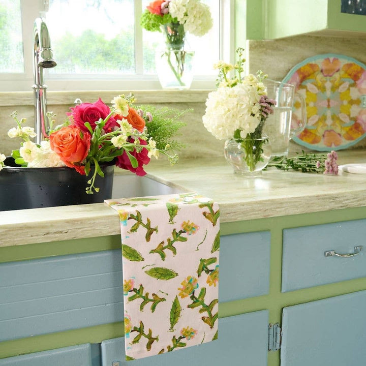 Laura Park Designs Flor Rosa tea towel with vibrant floral pattern, perfect for home kitchen decor.