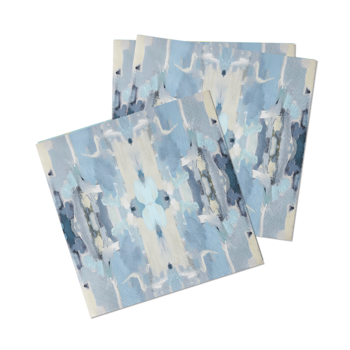 Set of Ocean Breeze cocktail napkins by Laura Park Designs featuring coastal-inspired blue and white patterns for home entertaining.