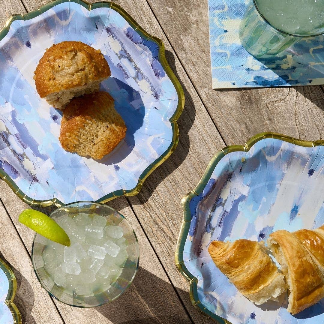 Set of Ocean Breeze cocktail napkins by Laura Park Designs with blue and white ocean-inspired pattern for home use.