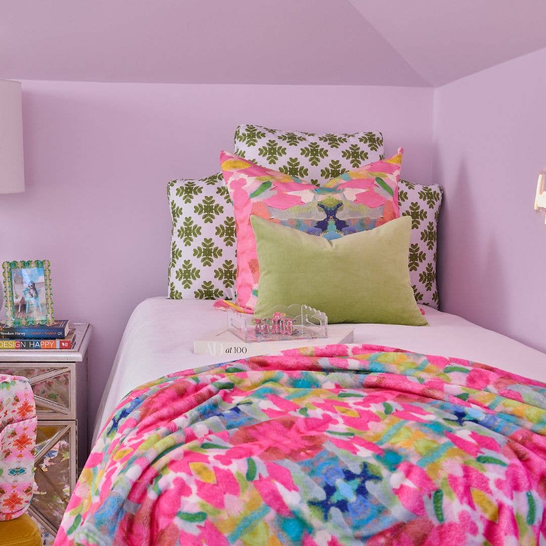 Pink Paradise fleece blanket by Laura Park Designs, soft cozy throw with vibrant pink color and plush texture for home decor.