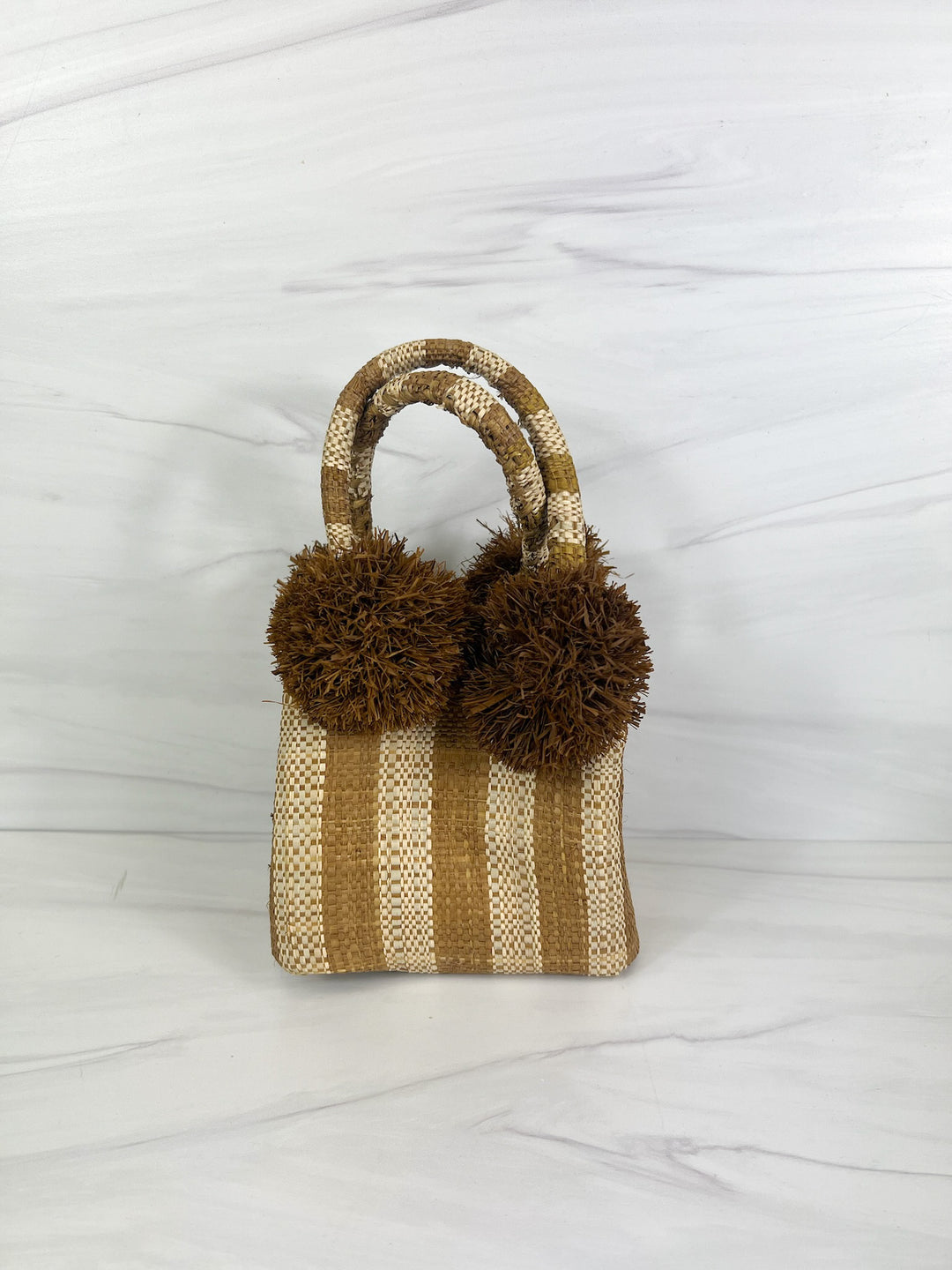 Lemon Cabana straw mini bag with short handles, perfect for accessories and casual summer outfits.