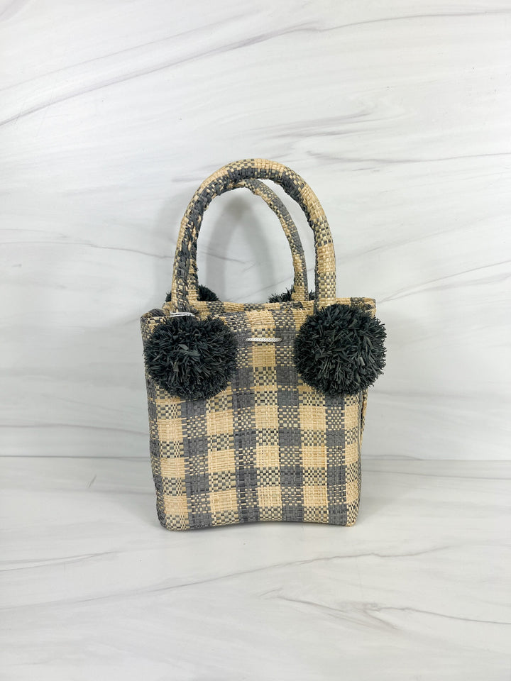 Lemon Cabana straw mini bag with woven design and short handles, perfect for casual accessories and summer outings.