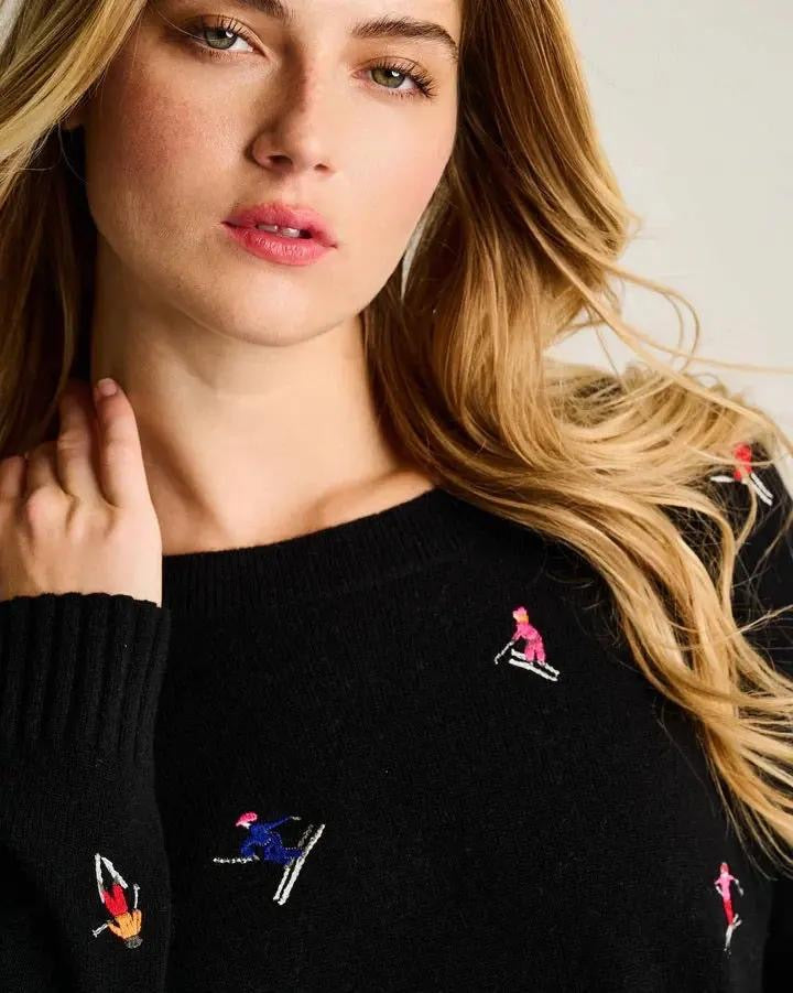 Lisa Todd International Hit The Slopes sweater, a cozy knit top with mountain and snowflake patterns, perfect for winter wear.