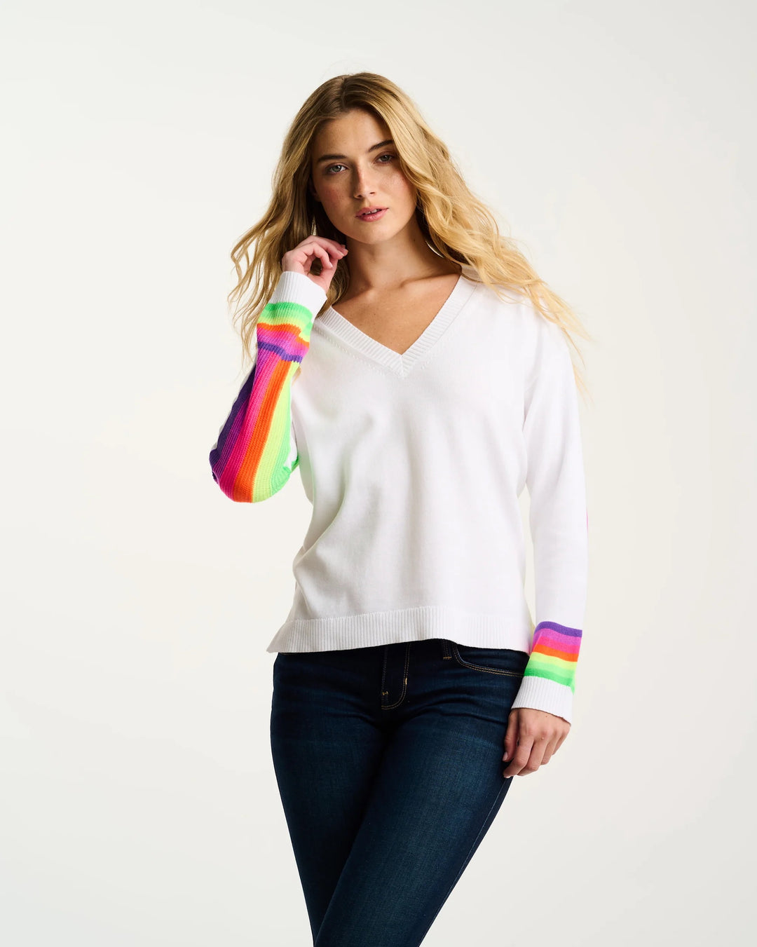 Lisa Todd International Brite Side cotton sweater, soft and stylish tops with a relaxed fit, shown on a hanger against a neutral background.