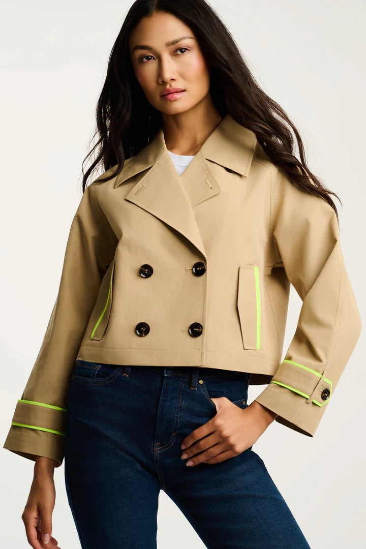 Lisa Todd International in trench coat tops, featuring a stylish, tailored design with a classic collar and button details.