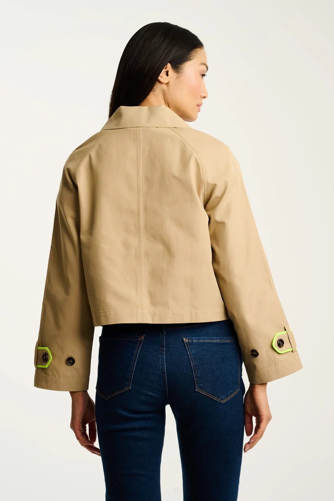 Lisa Todd International in trench coat, stylish tops with a tailored fit, featuring a classic design and neutral color.