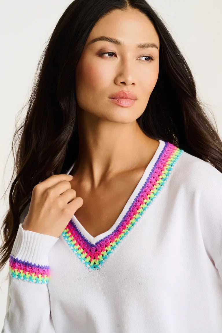 Lisa Todd International In The Mix Sweater, stylish knit top with colorful pattern, close-up view of fabric and design details.