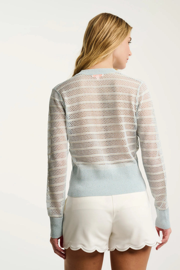Lisa Todd International Glimmer Sweater, stylish tops in soft fabric with shimmering details, worn by a model.