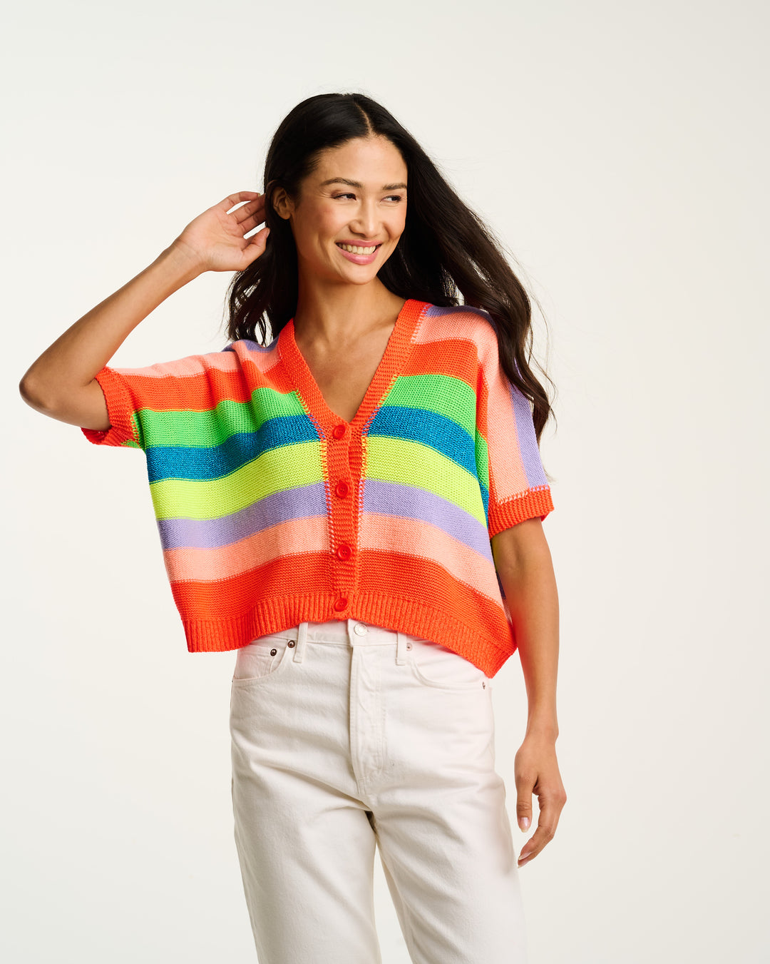 Lisa Todd International Luminosa Sweater, colorful knit tops with intricate patterns, displayed on a model.