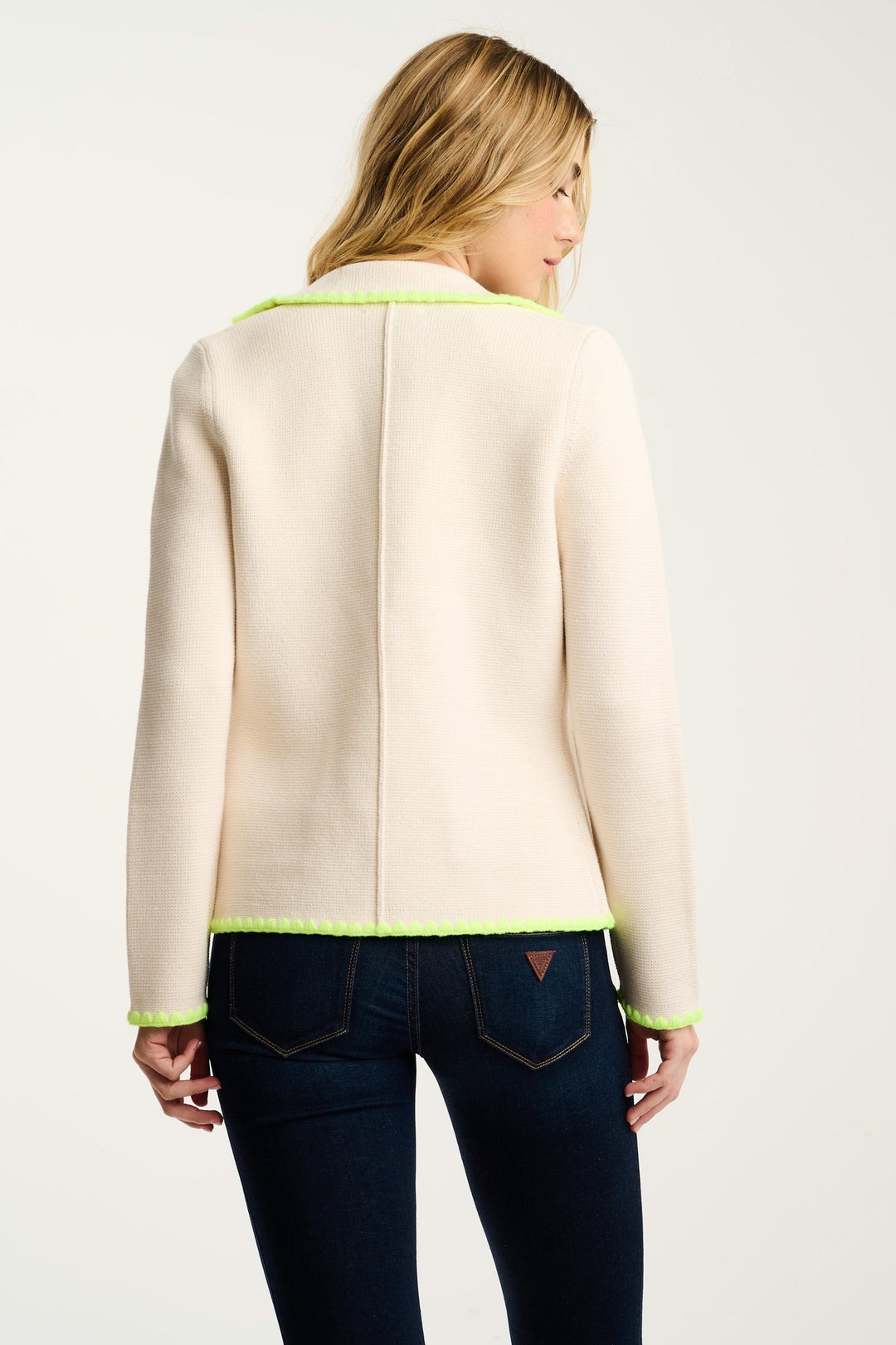 Lisa Todd International Stitchy Mix Blazer, stylish women's tops with a colorful, textured stitch pattern, displayed on a hanger.