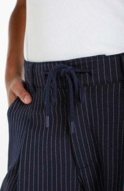 Liverpool Jeans 30-inch pleat trouser with side stripe, stylish bottoms featuring a tailored fit and sleek side detailing.