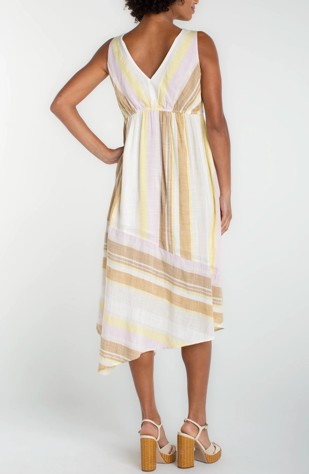 Neopolitan Stripe Dress by Liverpool Jeans, featuring colorful striped pattern and casual fit, displayed on a hanger.