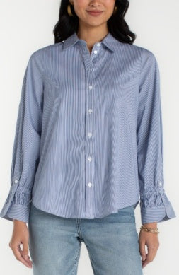 Light blue adjustable sleeve blouse by Liverpool Jeans, featuring a relaxed fit and button front, perfect for casual or professional wear.