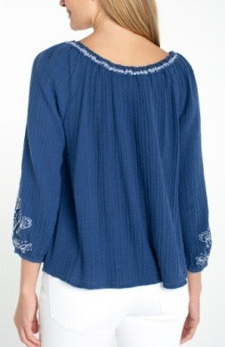 Woven 3/4 sleeve embroidered top by Liverpool Jeans, featuring intricate embroidery and lightweight fabric, styled on a hanger.