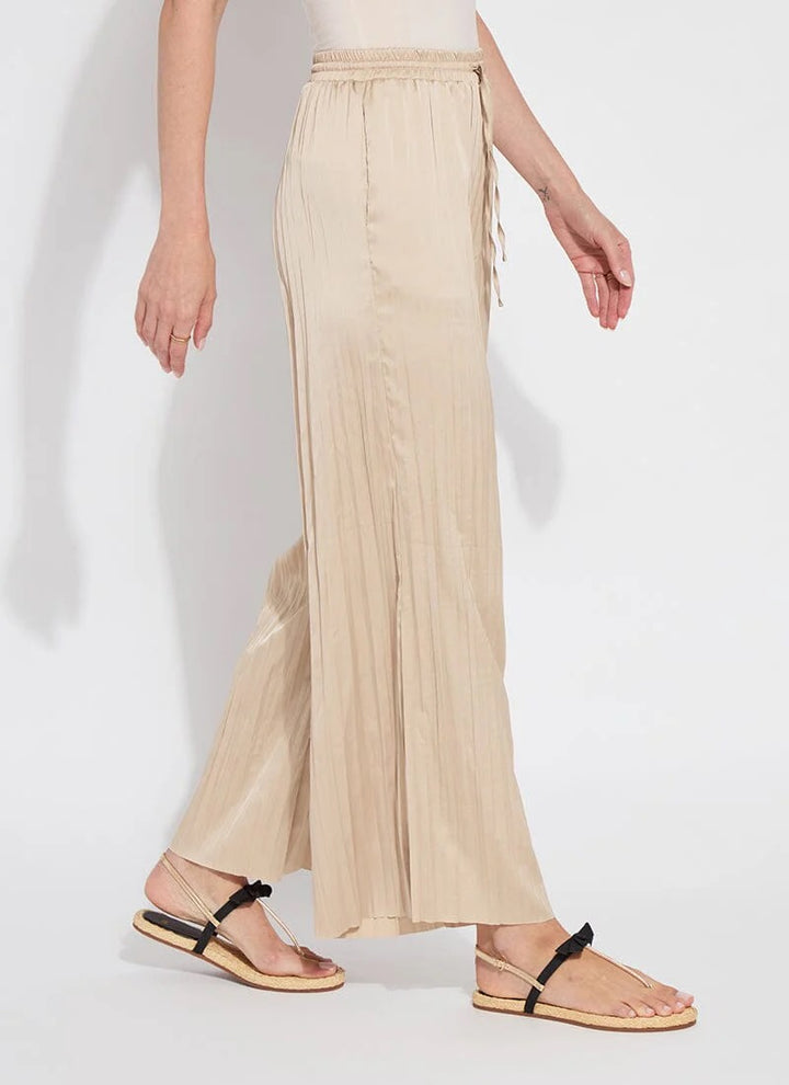 Lysse packable 28-inch Palazzo Pant in lightweight, flowy fabric, shown folded with relaxed wide-leg style and comfortable waistband.