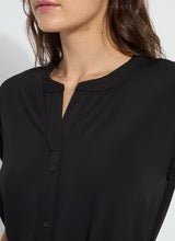 Lysse Blakely pull-on dress in soft fabric, showcasing a fitted silhouette with a round neckline and short sleeves.