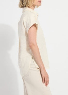 Lysse Althea Collar Linen Shirt, a stylish women's top with a collar and lightweight linen fabric, displayed on a hanger.