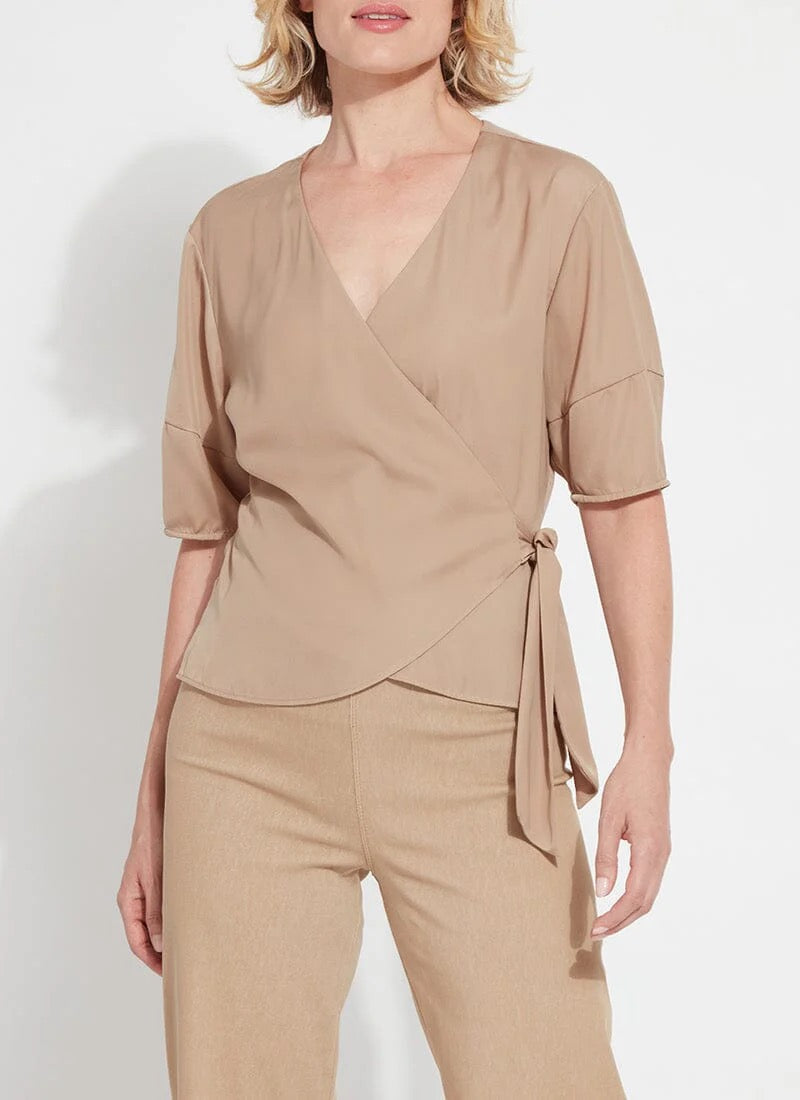 Lysse Juno tie-front top in soft fabric, featuring a stylish tie detail at the front and long sleeves.
