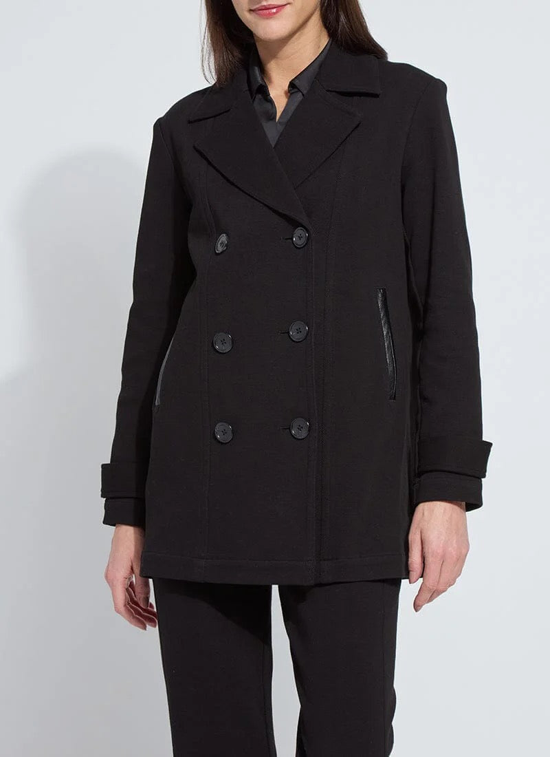 woman wearing black mid-thigh peacoat with buttons on a white background