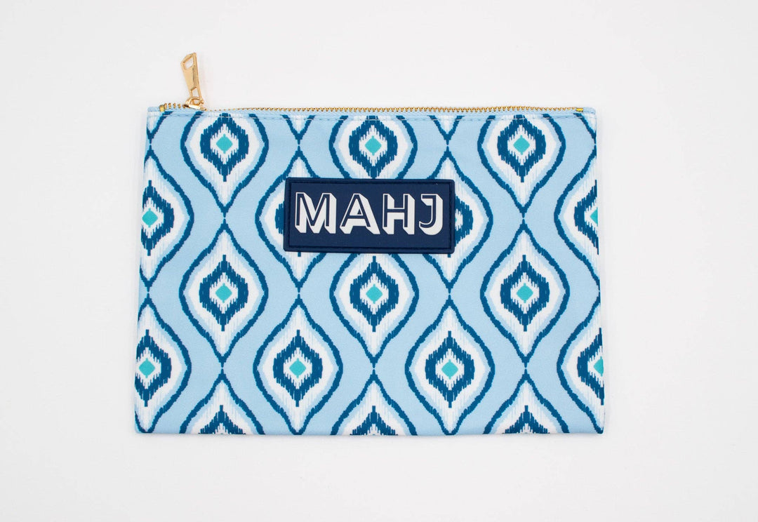 My Fair Mahjong gift bag with mahjong cards and accessories, featuring colorful designs on a sturdy storage bag.