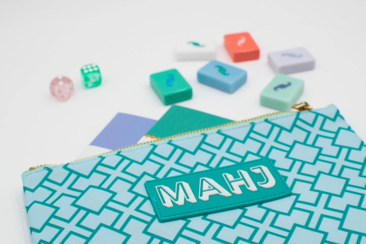 My Fair Mahjong gift bag featuring colorful mahjong card and accessory designs, ideal for storing game pieces and accessories.