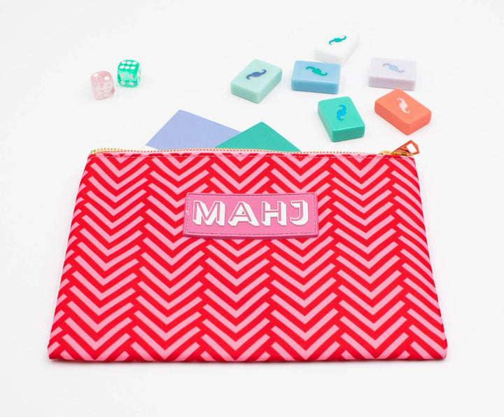 My Fair Mahjong gift bag with mahjong cards and accessories, featuring colorful design and sturdy fabric for storage and gifting.
