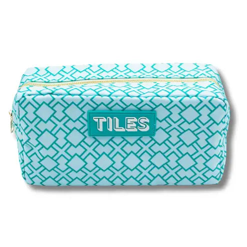 Set of Mahjong tile bags from My Fair Mahjong, perfect for gifting, featuring traditional fabric with intricate Asian-inspired patterns.