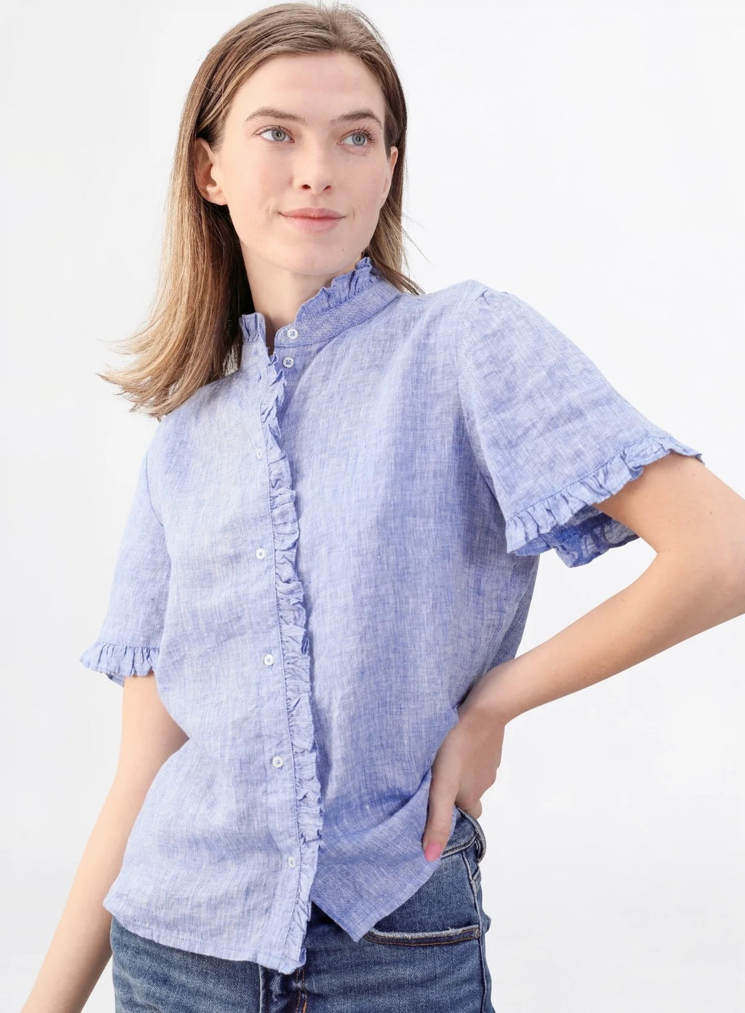Navy Bleu Bessie Chambray Blouse, a stylish casual tops with a button-up design and relaxed fit, shown on a model.