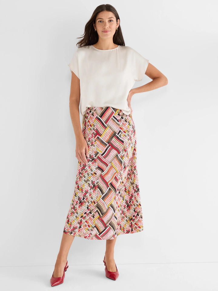 Nic & Zoe Colorweave Slip Skirt in vibrant fabric, showcasing its smooth, flowing design and stylish length.