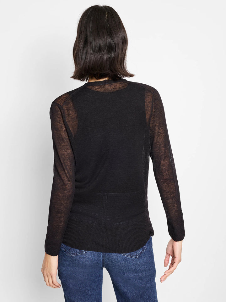 Nic & Zoe 4-Way Black Cardigan, versatile women's tops, shown worn open and buttoned, with long sleeves and soft knit fabric.