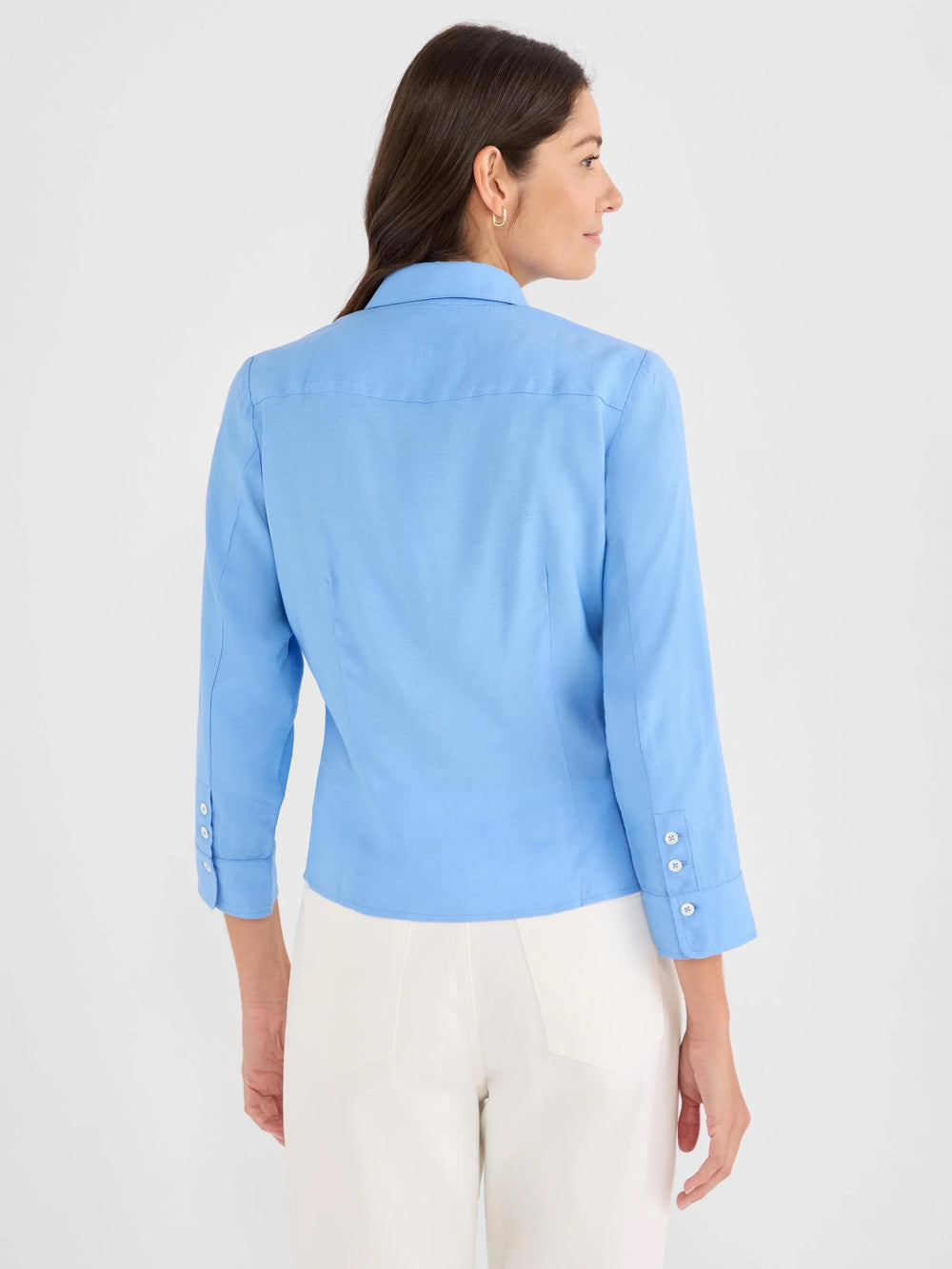 Navy blue Nic & Zoe French blue tie-shirt top with a classic collar and button-down front, displayed on a hanger.