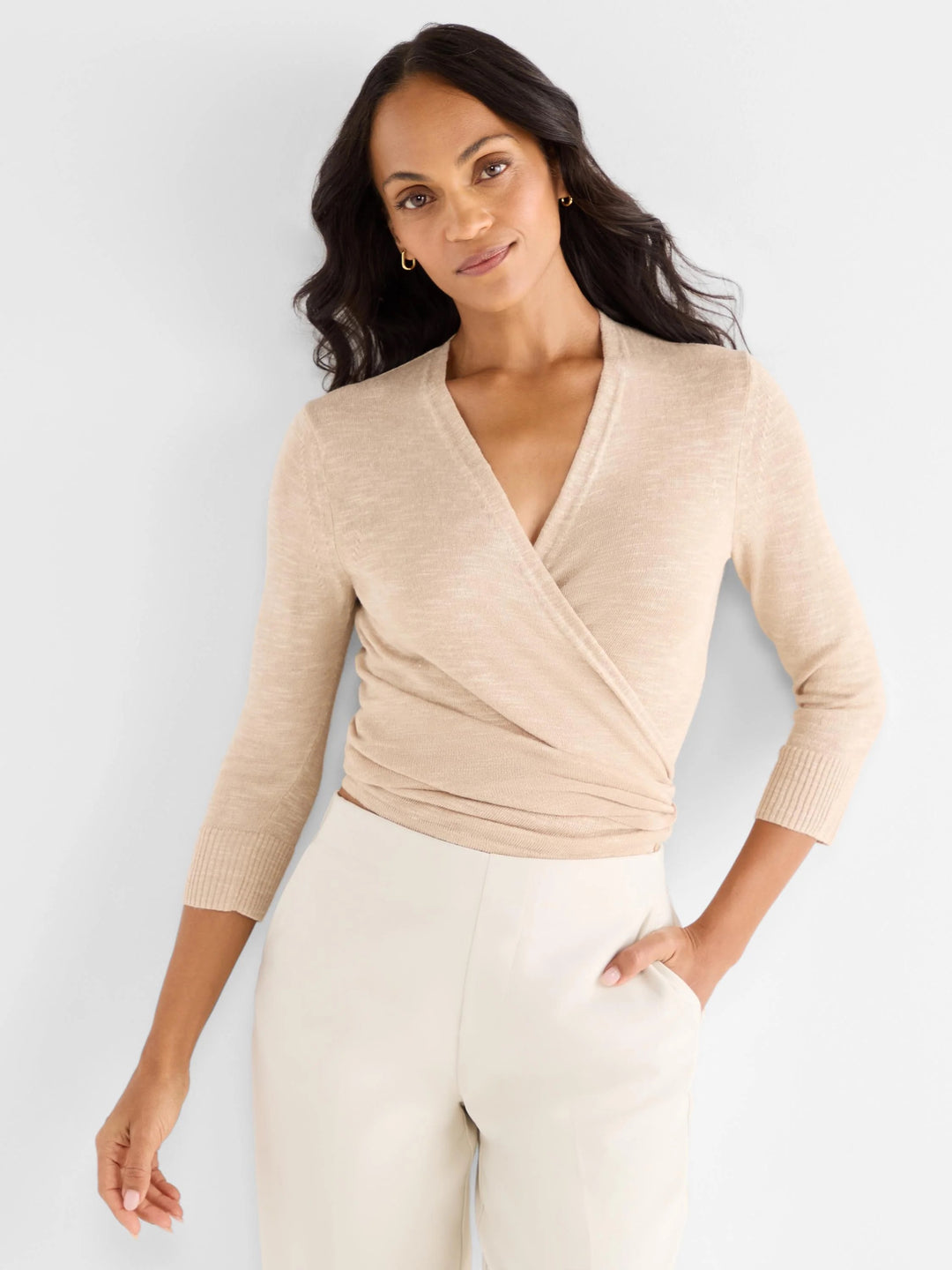 Nic & Zoe 4-Way Knit Cardigan tops, featuring a cozy, versatile knit pattern in neutral tones, displayed on a hanger.