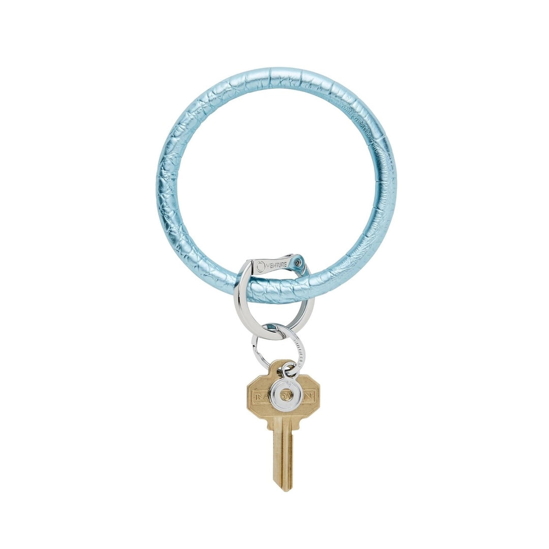 O-venture leather "O" Ring key ring with a stylish leather strap and metal ring, perfect for holding keys and accessories.