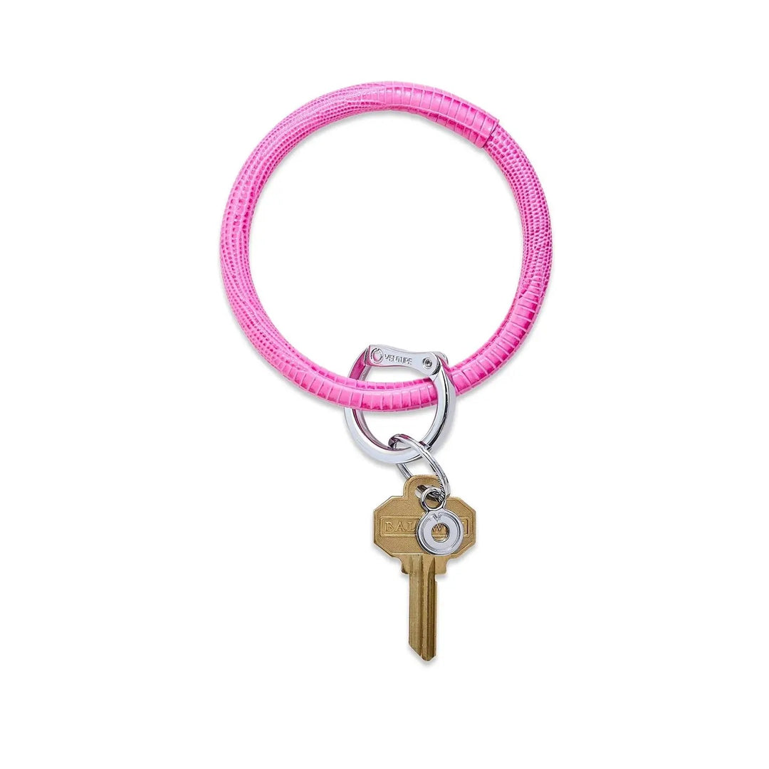 O-venture leather key ring with "O" ring design, perfect for gifts and everyday use, showcasing a stylish leather accessory.