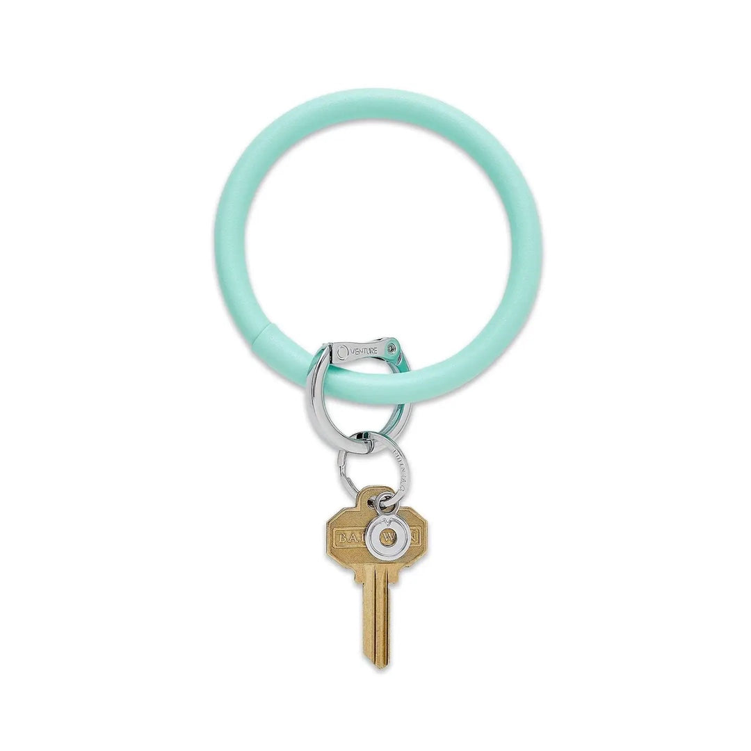 O-venture leather "O" ring key ring with durable leather strap and metal ring, ideal for organizing keys or as a gift.