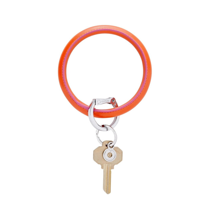 O-venture "O" Ring leather key ring with a sleek leather strap and metal "O" ring, perfect for holding keys or accessories.
