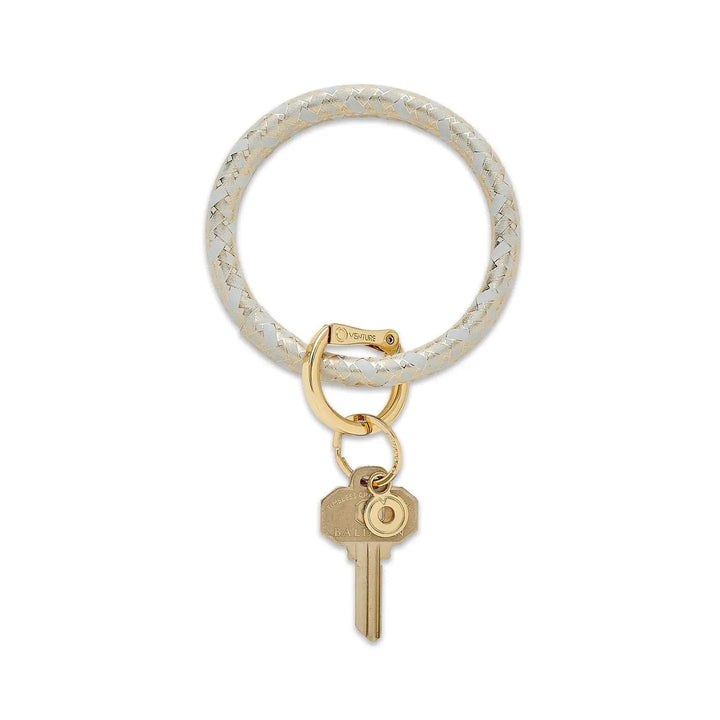 O-venture leather key ring with "O" ring design, stylish gift accessory for holding keys and small items.