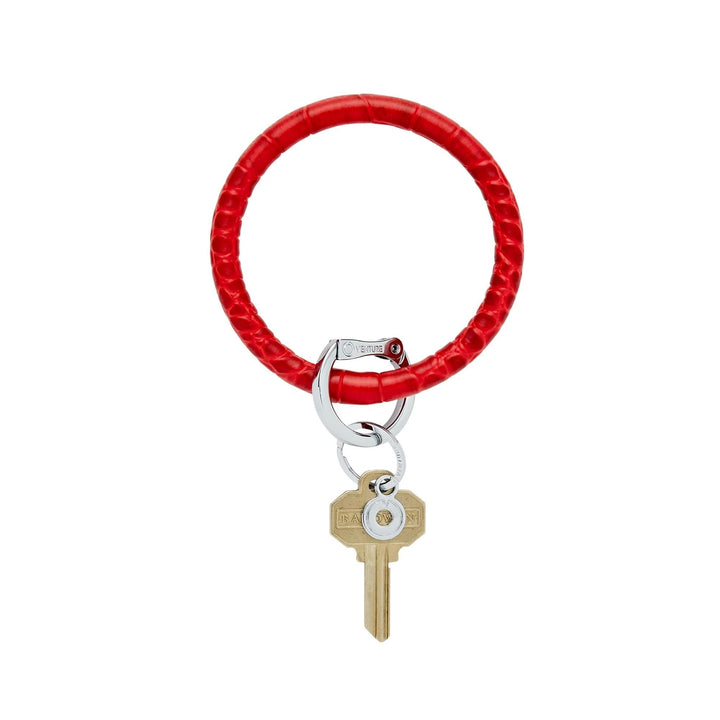 O-venture leather "O" Ring key ring with attached leather strap and silver hardware for stylish key organization.
