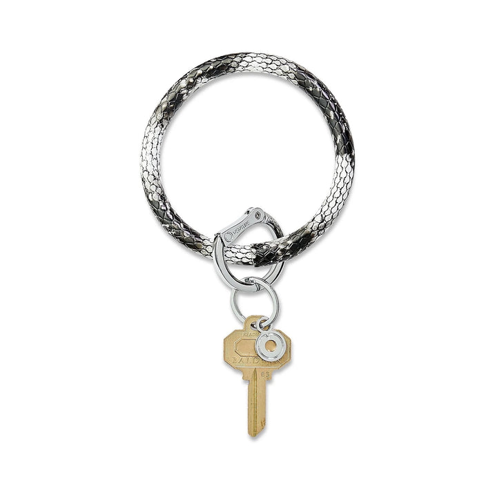 O-venture leather "O" ring key ring with sleek design, featuring a durable leather strap and metal ring for keys or accessories.