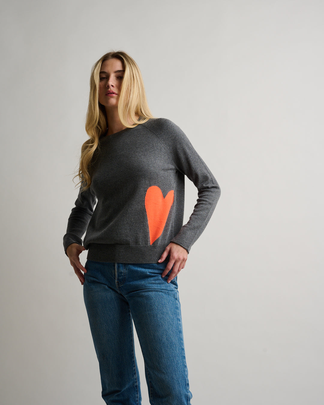 Lisa Todd International Love Lounge Fog sweater, cozy tops with soft fabric and stylish fit, shown in a relaxed fashion pose.